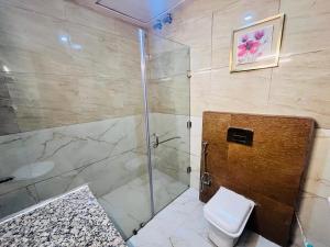 Koupelna v ubytování Hotel Agm + 2 fotografie