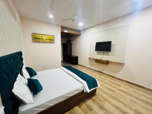 TV a/nebo společenská místnost v ubytování Hotel Agm