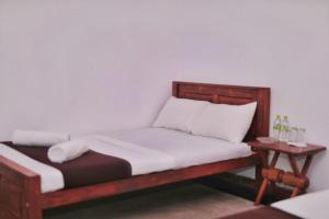 En eller flere senge i et værelse på Yala Masan Hideout + 14 billeder