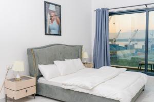 Ένα ή περισσότερα κρεβάτια σε δωμάτιο στο Sweet Apartments +7 φωτογραφίες
