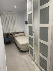 Ένα ή περισσότερα κρεβάτια σε δωμάτιο στο Alameda 16 Apartment Beach Old Town