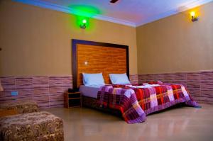 Ένα ή περισσότερα κρεβάτια σε δωμάτιο στο Abba Suites