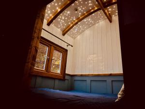 a room with a window and a bed in it at Worcester Escape in Hallow