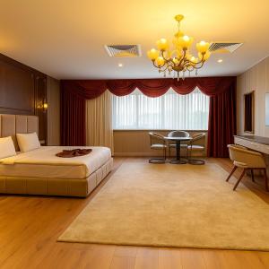 Postel nebo postele na pokoji v ubytování Volonte Hotel & Spa