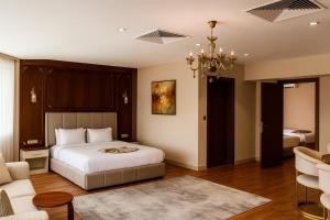 Postel nebo postele na pokoji v ubytování Volonte Hotel & Spa + 5 fotografií