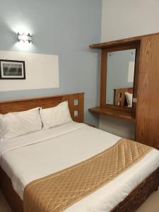 Ένα ή περισσότερα κρεβάτια σε δωμάτιο στο SPACE 4 RESORTS