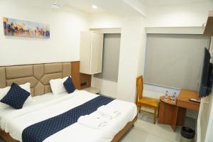 Ένα ή περισσότερα κρεβάτια σε δωμάτιο στο Hotel Velvet Park