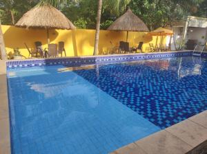 Bazén v ubytování Nova Costeira da Barra nebo v jeho okolí