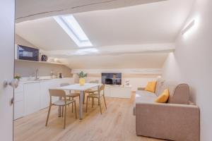 Kuchyň nebo kuchyňský kout v ubytování Corso Adriano 13 - Via Emilia