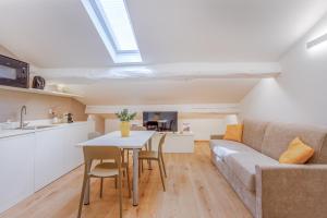 Kuchyň nebo kuchyňský kout v ubytování Corso Adriano 13 - Via Emilia + 8 fotografií