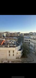 a view of a city with buildings and a street at Lux Central Apartment in Kilkís