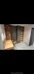 a small room with a desk and a chair at Lux Central Apartment in Kilkís +7 photos