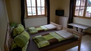 A bed or beds in a room at Holiday House Spanner