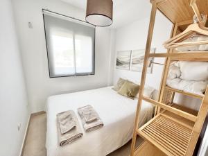 a bedroom with a bunk bed and a ladder at Mediterranean Way - Miami Beach in Miami Platja +21 photos