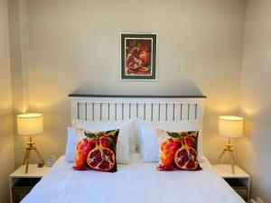 Ένα ή περισσότερα κρεβάτια σε δωμάτιο στο Granaat Pit Self Catering