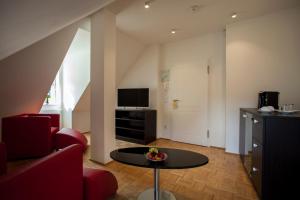 TV a/nebo společenská místnost v ubytování Residenz Itterbach