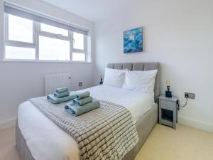 En eller flere senge i et værelse på Brighton Escape + 7 billeder