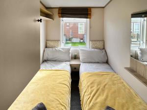 Ένα ή περισσότερα κρεβάτια σε δωμάτιο στο Skokholm