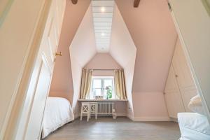 Ένα ή περισσότερα κρεβάτια σε δωμάτιο στο Ruem Hart