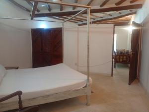 En eller flere senge i et værelse på Casuarina Beach House, Malindi + 6 billeder