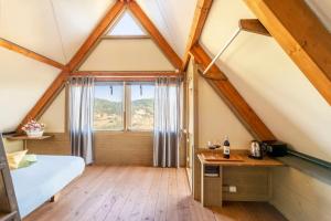 Postel nebo postele na pokoji v ubytování Il Castagno Toscana Glamping