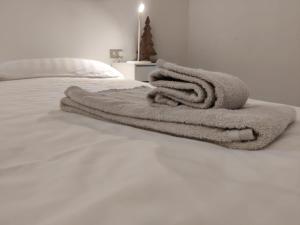 Ένα ή περισσότερα κρεβάτια σε δωμάτιο στο Vetta Lodge +68 φωτογραφίες