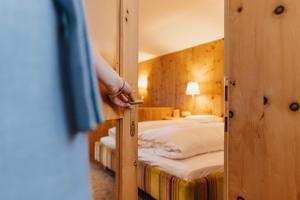 Giường trong phòng chung tại Hotel Aurora