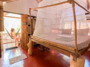 Postel nebo postele na pokoji v ubytování Valampuri Kite Resort + 80 fotografií