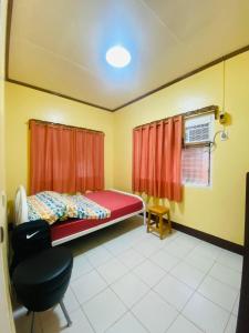 Postel nebo postele na pokoji v ubytování Namasté Olango Guest House