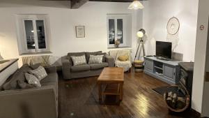 Χώρος καθιστικού στο Le moulin de Houbronne