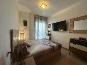 TV a/nebo společenská místnost v ubytování Sole mío