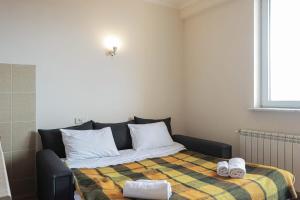 Postel nebo postele na pokoji v ubytování Wehost Cozy and Comfortable Studio