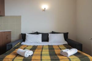 Postel nebo postele na pokoji v ubytování Wehost Cozy and Comfortable Studio