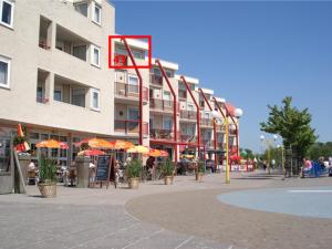 a large building with a basketball hoop in front of it at Appartement Residence Sudersee in Holle Poarte