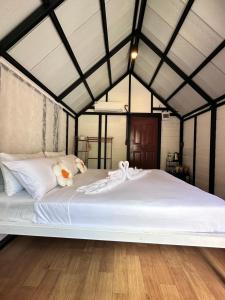 Ένα ή περισσότερα κρεβάτια σε δωμάτιο στο Lantamangrove