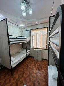 Ένα ή περισσότερα κρεβάτια σε δωμάτιο στο Хостел Ганга