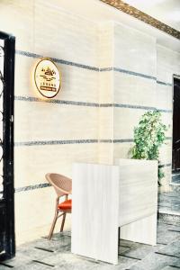 Posezení v ubytování Legend Pyramids Inn + 25 fotografií