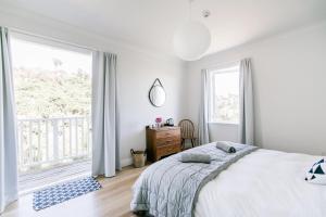 Letto o letti in una camera di The Pear Orchard Lodge