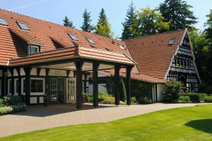 Ein Garten an der Unterkunft VILA VITA Burghotel Dinklage