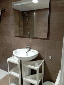 Ένα μπάνιο στο Habitaciones Algodón con baño propio