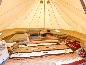 Ένα ή περισσότερα κρεβάτια σε δωμάτιο στο BASECAMP森林基地 I Glamping豪華露營-海拔820 雲海山嵐星空