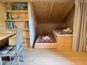 Voodi või voodid majutusasutuse Agriturismo Mondolegro - Chiesa in Valmalenco toas