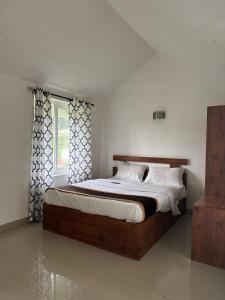 Ένα ή περισσότερα κρεβάτια σε δωμάτιο στο SPACE 4 RESORTS