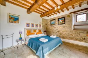 Ένα ή περισσότερα κρεβάτια σε δωμάτιο στο Agriturismo Le Sorgenti +51 φωτογραφίες