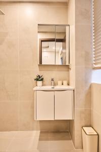 Koupelna v ubytování The Lumen Stay - Vinhomes Ocean Park 3