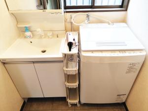 Fotografie z fotogalerie ubytování ビーチ コンビニ 温泉徒歩4分以内 BBQ無料 12人OK 5LDK戸建てWhite sun villa v destinaci Shirako + 35 fotografií