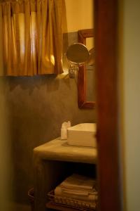 Koupelna v ubytování Whisper Point Eco Resort Diyaluma