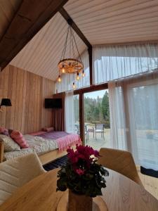 Ένα ή περισσότερα κρεβάτια σε δωμάτιο στο Braslas čuksti