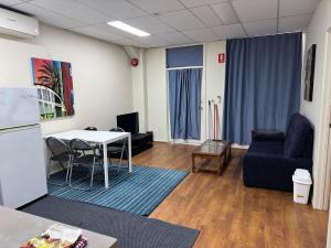 Posezení v ubytování MetaWise Charming Retreat at Huntingdale E4