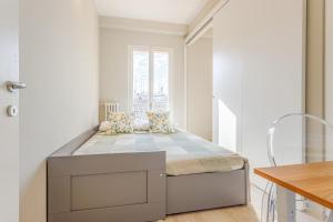 Una cama o camas en una habitación de Views on Ghirlandina in the heart of MotorValley 20 fotos más